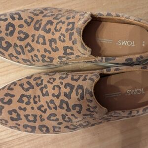 TOMS Tan and Black Leopard Slip-Ons